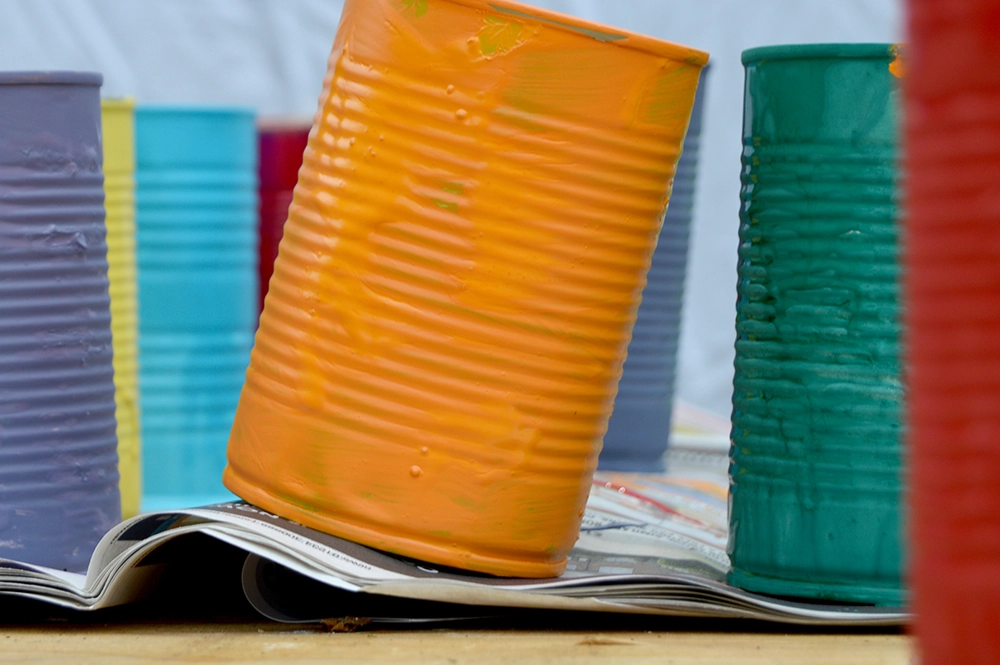 rainbow painted tin cans