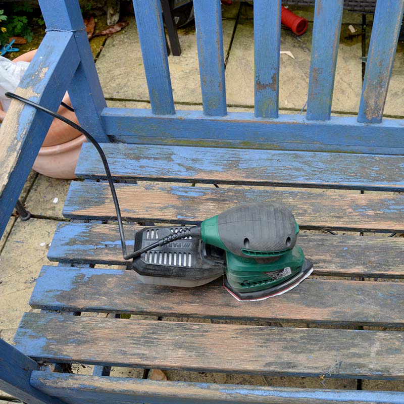 Sanding garden bench ready for decoupage