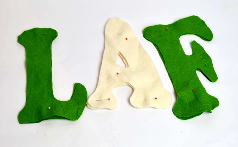 Pinned felt letters