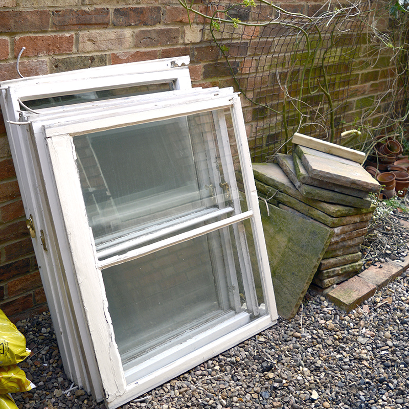 Old sash windows upcycled into herb planter