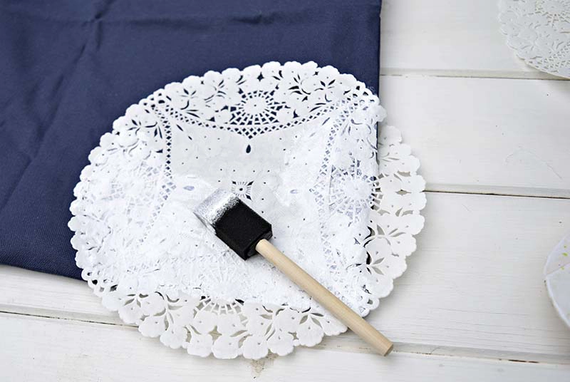 Stencilling a cushion / pillow with a doily