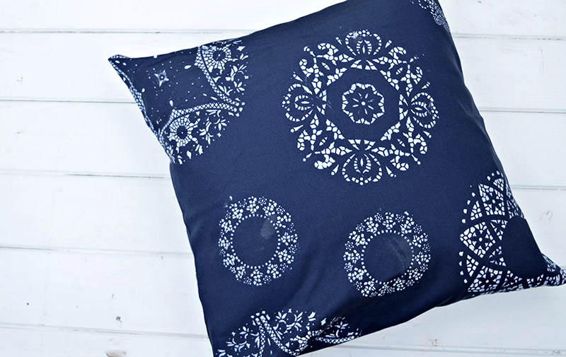 Stenciled doily cushion / pillow.