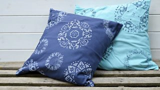 Fun and easy to do doily stenciled cushions.