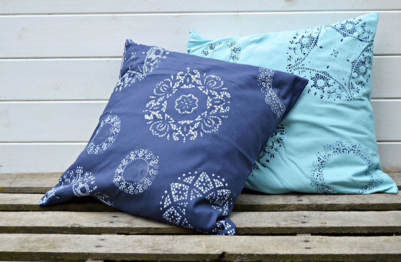 Fun and easy to do doily stenciled cushions.
