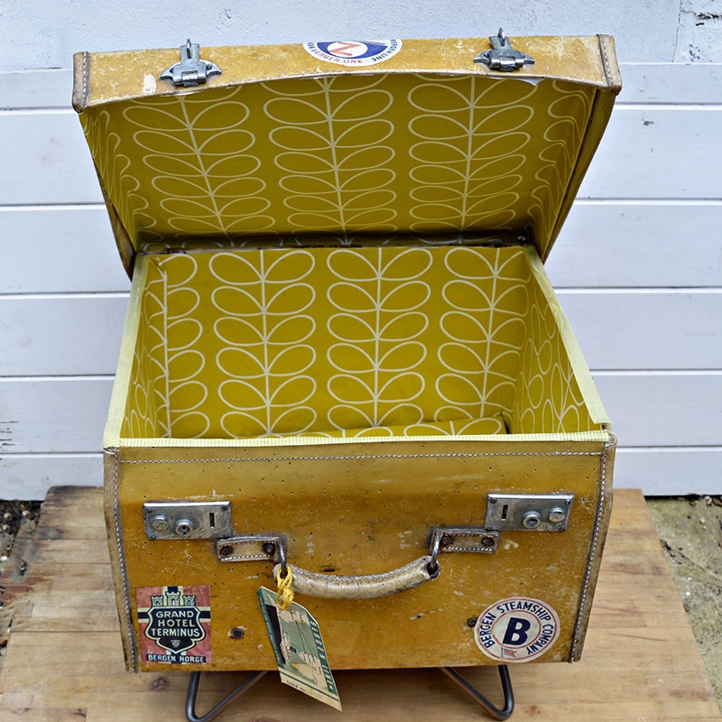  Vintage suitcase upcycled with Orla Kiely wallpaper for a great vintage look.