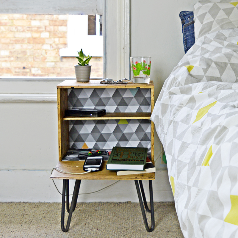 DIY Nightstand- Made with an wine box.  Waxed to age it, used the lid to make shelves and then added some legs.  Full tutorial.