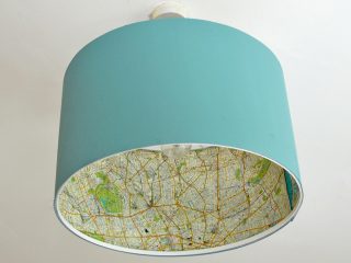 Easy Ikea lamp hack of a rismon lampshade with decoupaged maps.