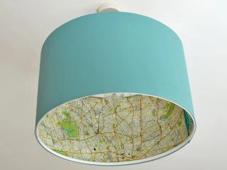 Easy Ikea lamp hack of a rismon lampshade with decoupaged maps.
