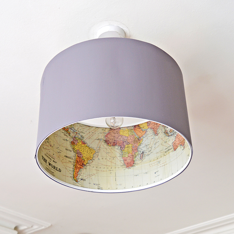 Ikea lamp hack - Decoupage a world map on the inside of an Ikea Rismon lamp to turn it into something special.