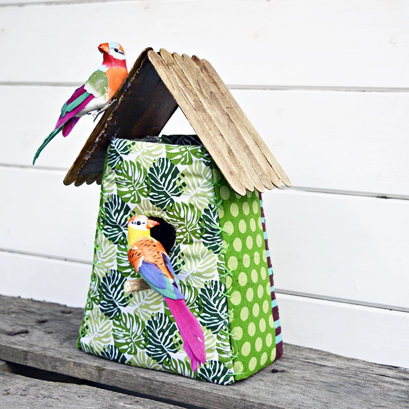 These gorgeous tropical fabric birdhouses are really easy to make.  They make for a lovely home decoration or even a gift.  Step by step tutorial and free pattern.