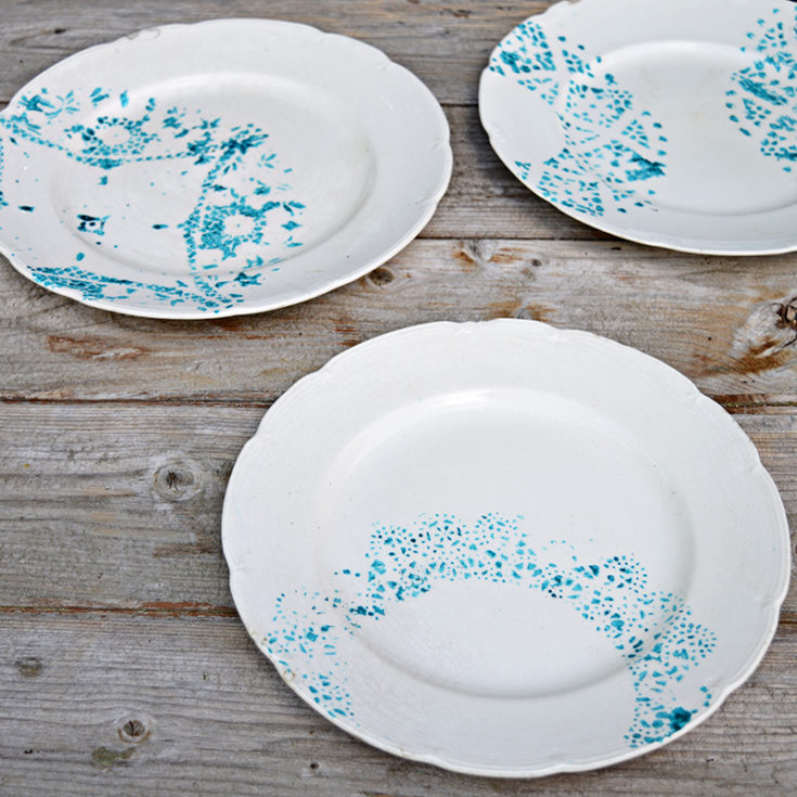 Make a painted plate with a paper doily. A great way to upcycle and revamp old crockery.