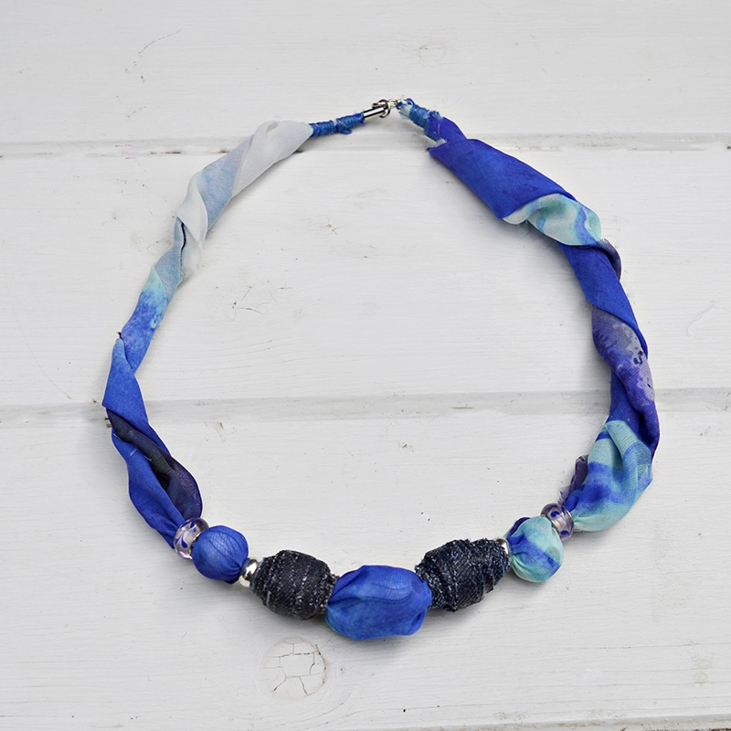 Make your own DIY Jewelry from upcycled scarfs and denim beads. Full tutorial.