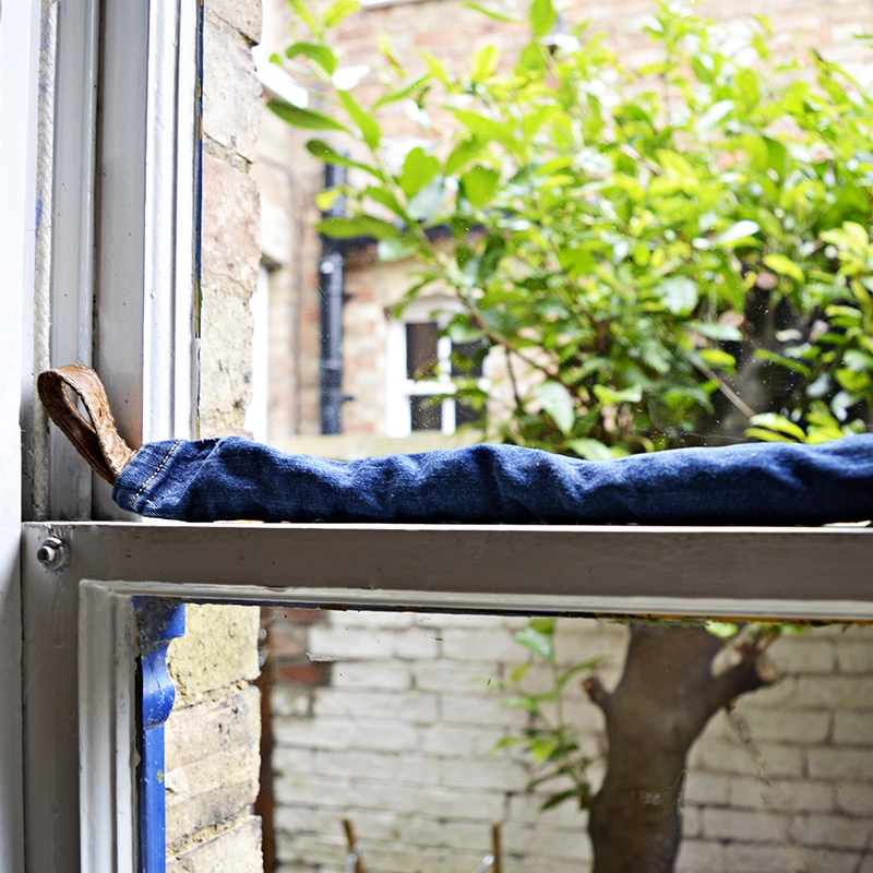 Window Diy draught excluder - made from upcycled jeans, great for sash windows.