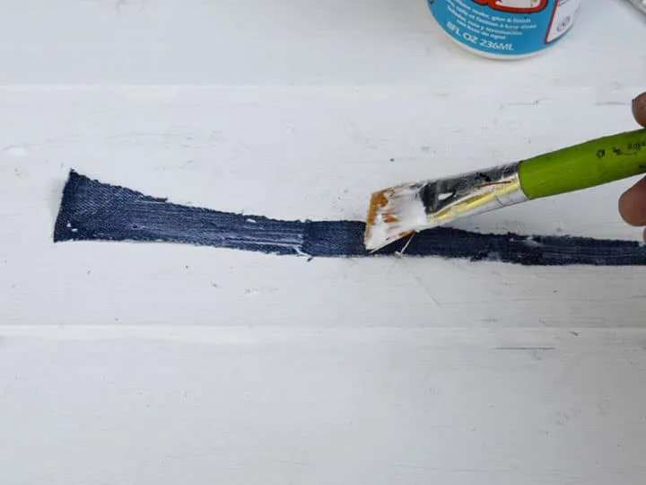 pasting the denim strips