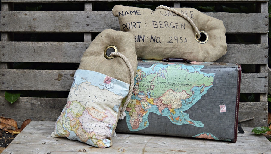 Full tutorial on how to make these unique map burlap pillows to look like luggage tags.