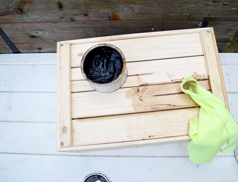 Waxing the crate for DIY ottoman