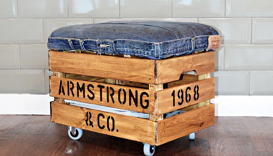 Make a nifty DIY ottoman with storage from a pair of jeans and an IKea Crate