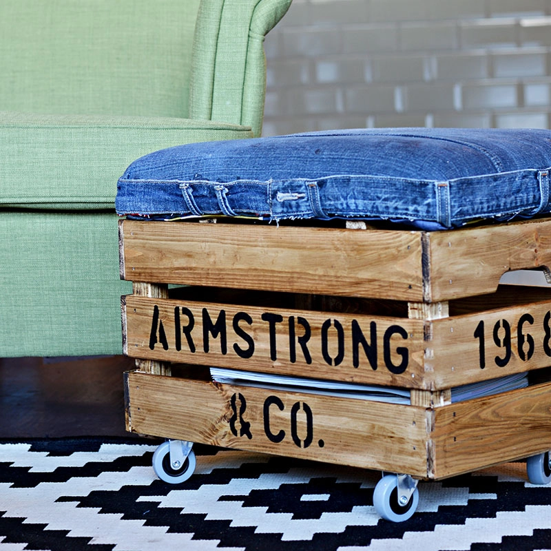 Nifty DIY Ottoman made from jeans and Ikea box.  Really handy storage too.