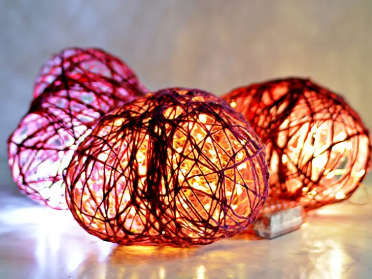 DIY Valentine's light decorations. Make string hearts and then use copper string lights to brighten up your Valentine's decor.