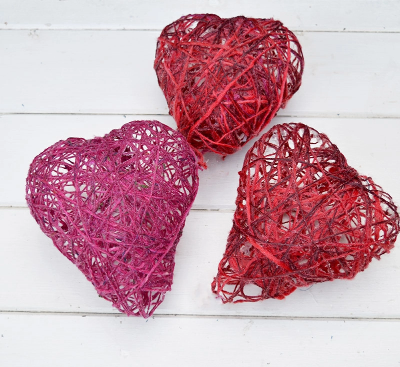 Making string hearts for  a gorgeous Valentine's light decorations.