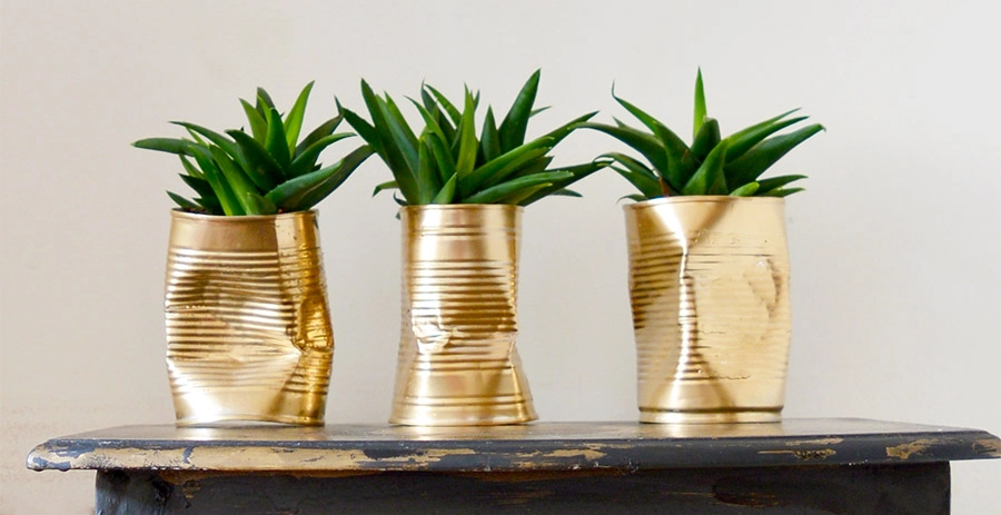 Make some unique diy planters. Crushed shabby glam gold tin can planters.