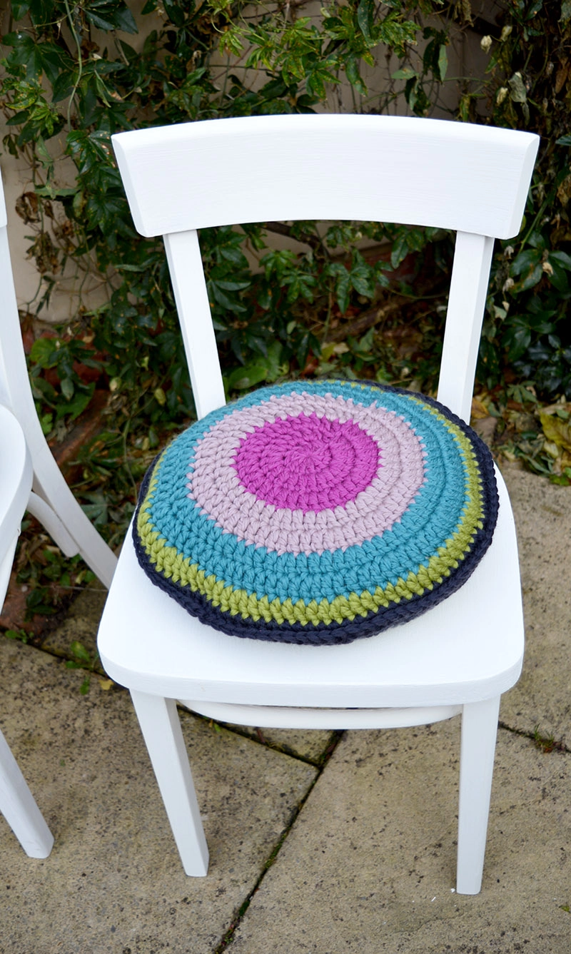 upcycled chair with colourful crochet seat pad.