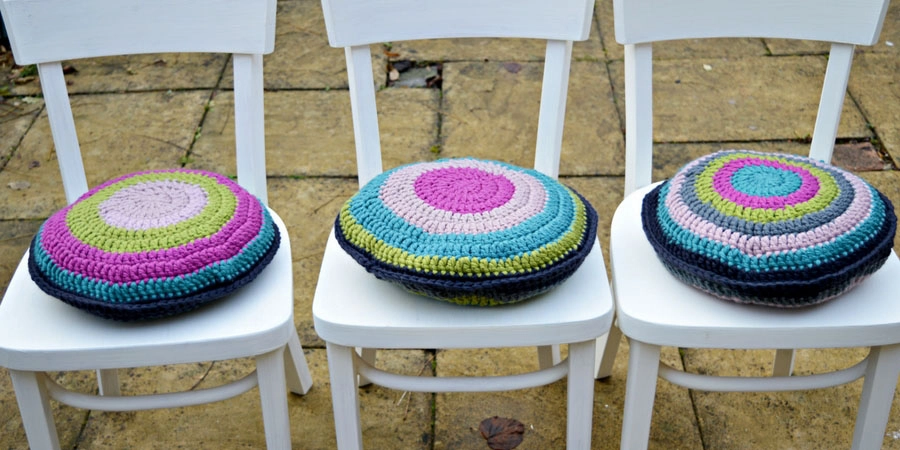 From drab to fab. Upcycled chairs with chalk paint and colourful crochet cushions.