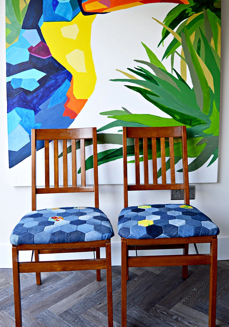Denim patchwork chairs made from upcycled old jeans using hand sewn denim hexagons.  Full tutorial.