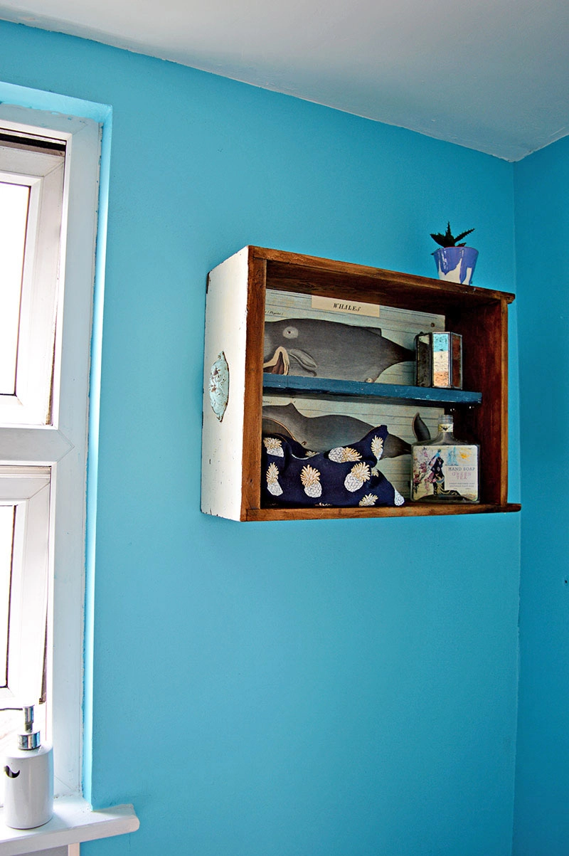 DIY Bathroom wall cabinet made from a recycled old drawer.
