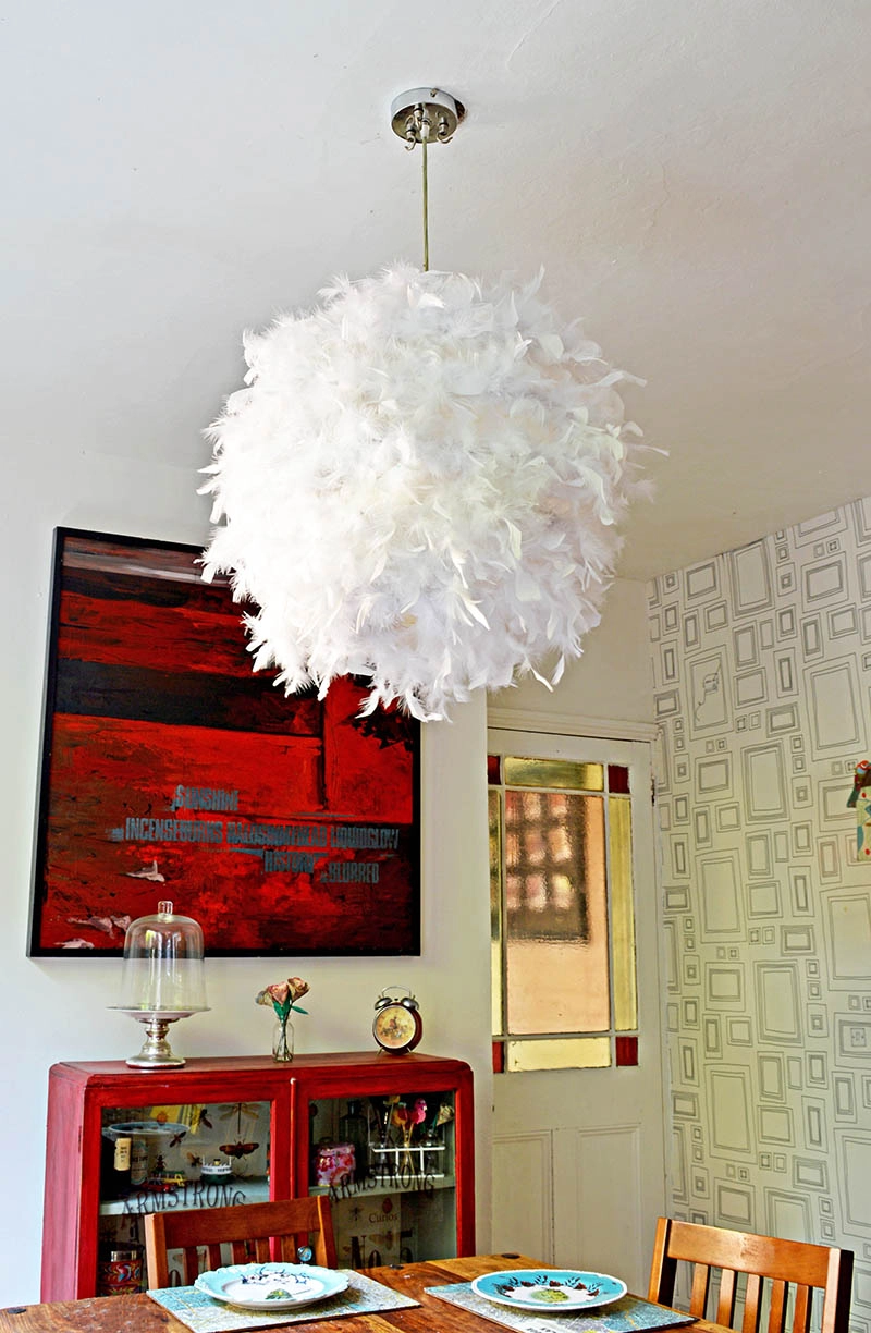 Make your own gorgeous DIY feather lampshade.  This simple IKEA hack will add a touch of glamour to any room.