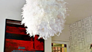 Make your own gorgeous DIY feather lampshade. This simple IKEA hack will add a touch of glamour to any room.