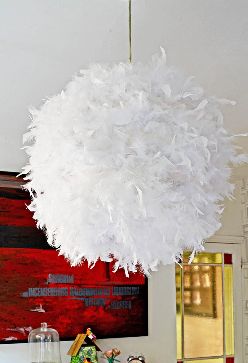 Make your own gorgeous DIY feather lampshade. This simple IKEA hack (Regolit) will add a touch of glamour to a room.