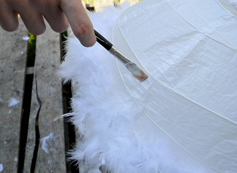 Sticking feather boa to lampshade