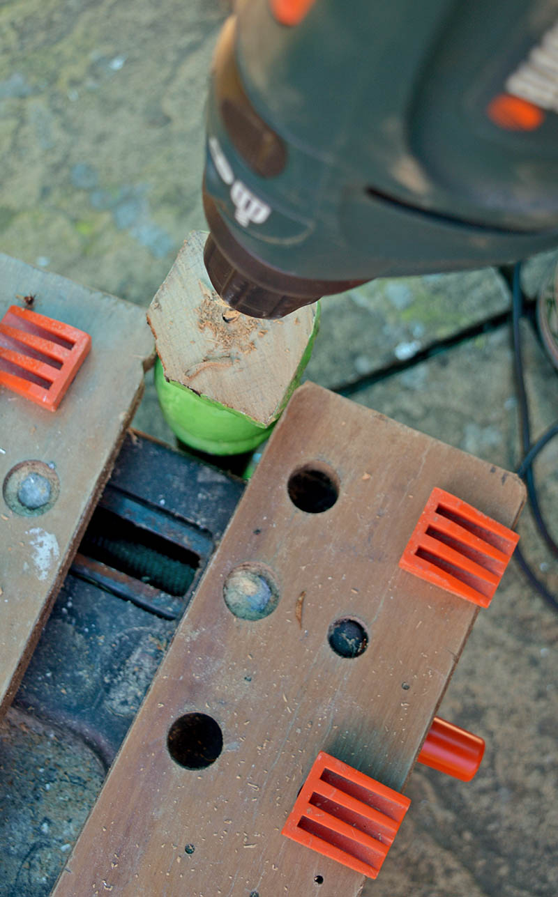 Drilling holes in bench leg