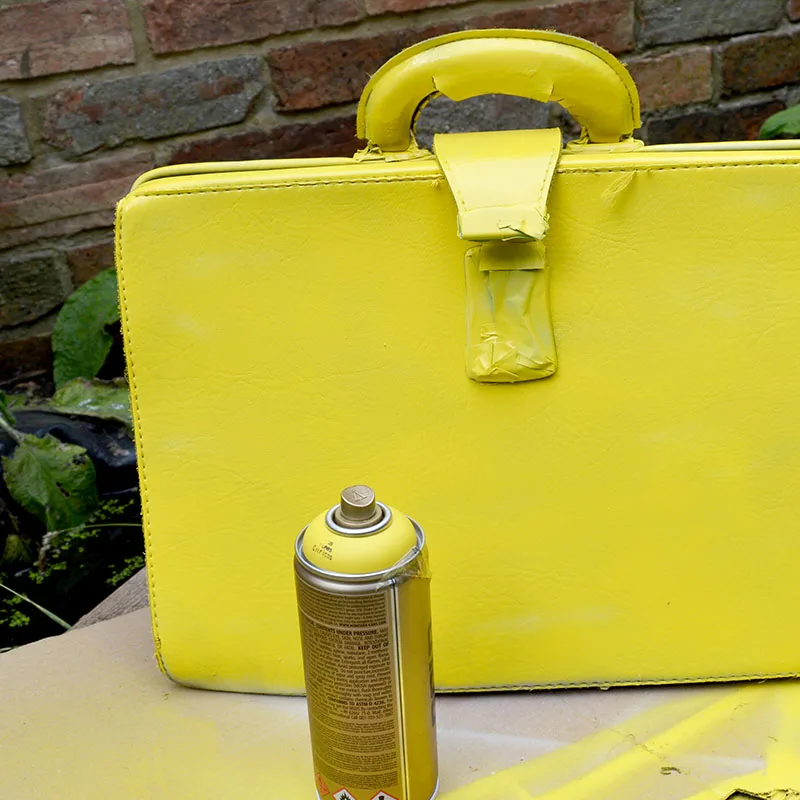 leather bag spray painted yellow
