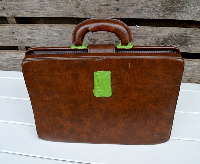 Taped up brief case for painting