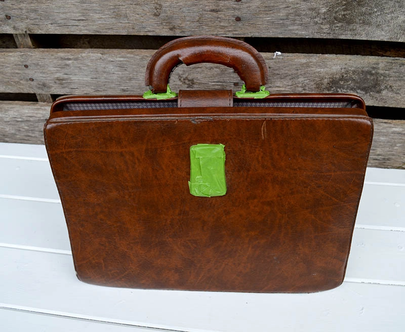 Taped up brief case for painting