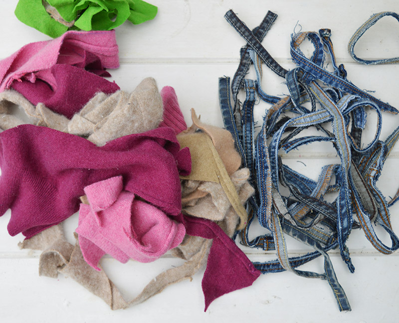 Felted sweater and denim scraps used for upcycled wreath