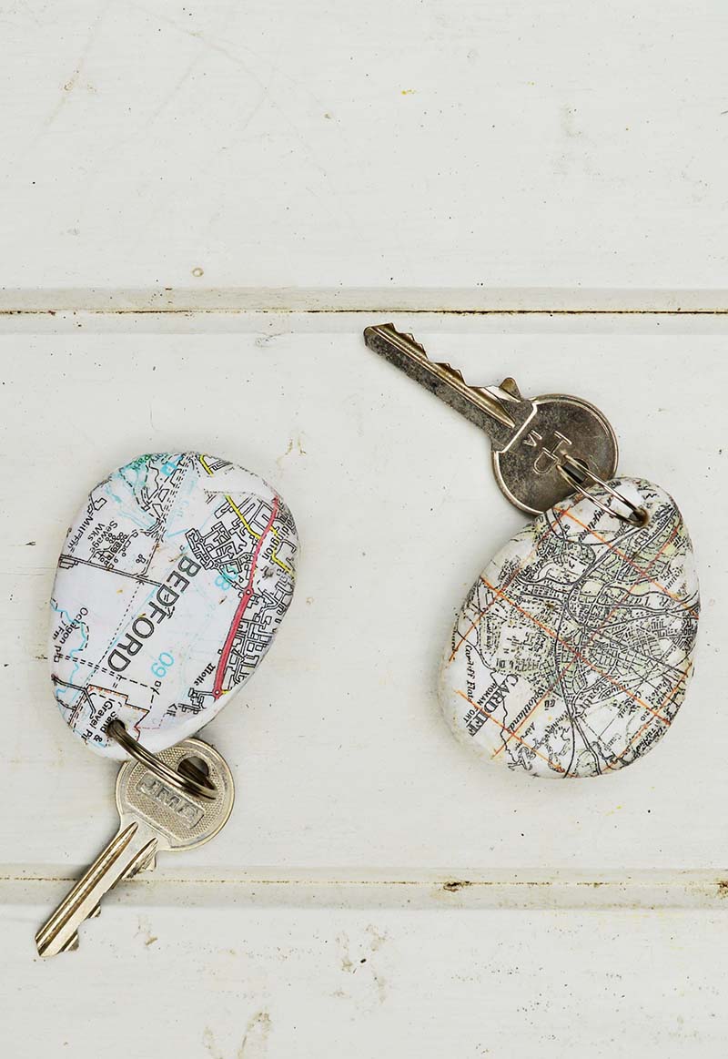 Print street maps onto stones and pebbles using Mod Podge to create a unique map rock keychain.  Makes for a lovely personalized gift.