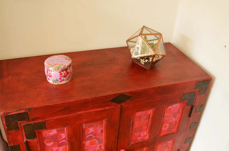 Cabinet upcycle with Annie Sloan's Emperor's Silk chalk paint and Marimekko paper napkins.