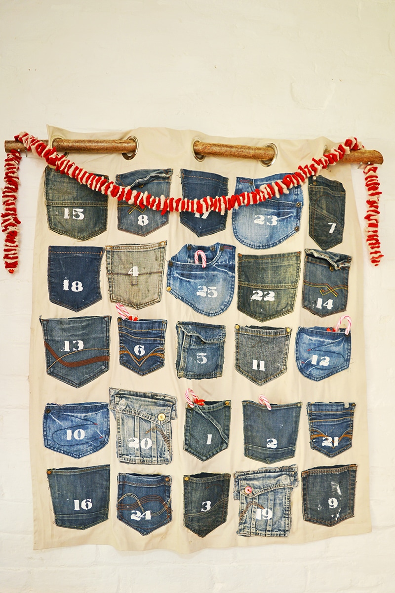 Homemade advent calendar made from the families jeans pockets. A really easy no so rustic Christmas calendar for that farmhouse/industrial look.