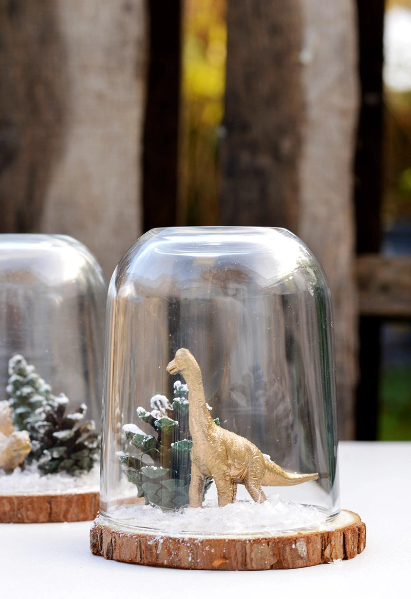 DIY Christmas Cloche, (dinosaur terrarium) using a repurposed Nutella jar.