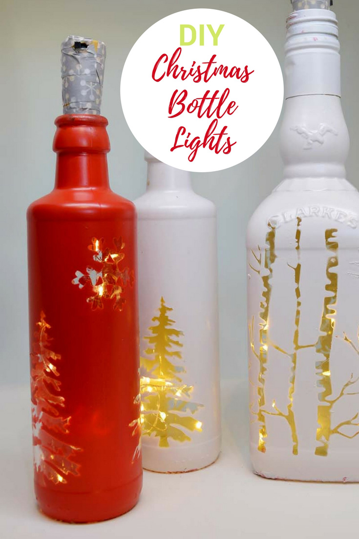 Using cork led lights make some gorgeous Christmas bottle lights to illuminate your home this winter.  So simple no glass drilling required. #Christmas #Christmascrafts #Christmaslights #bottlelights #lights