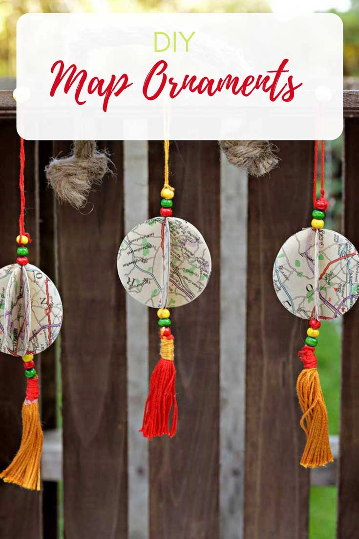 Repurpose old road maps into unique personailised Christmas ornaments with tassels.  