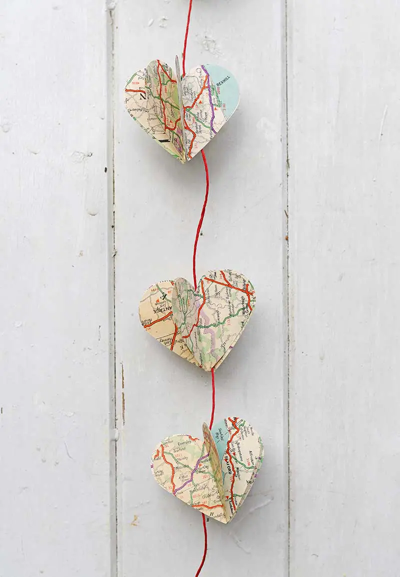 heart garland made from road maps