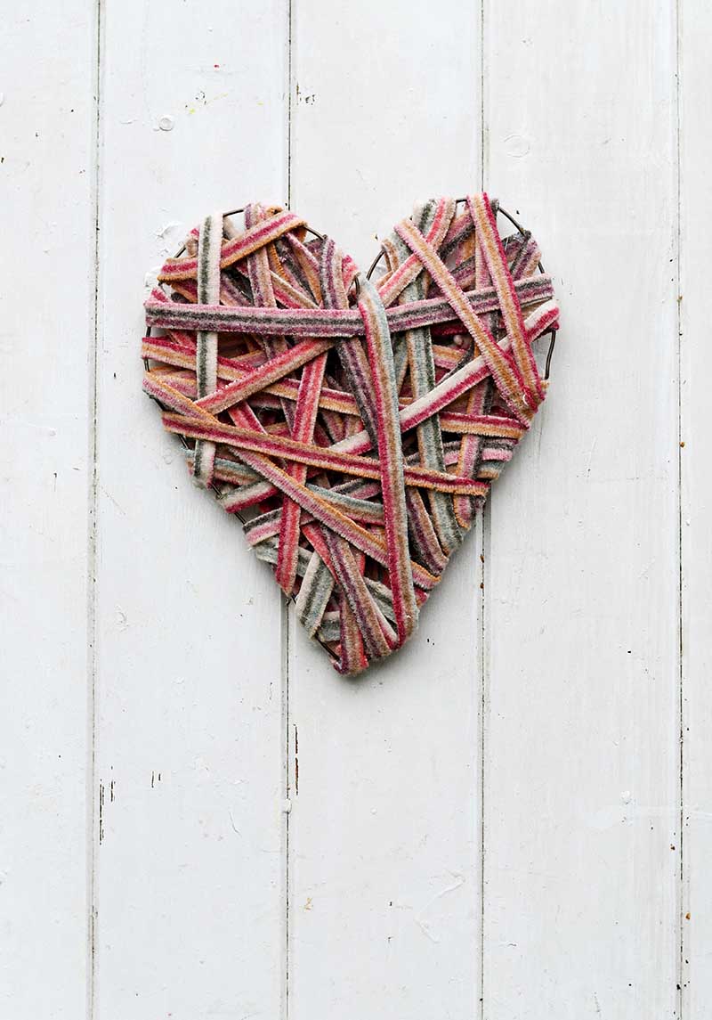 Felted yarn created from recycling sweaters to make a cute Valentine's heart decoration