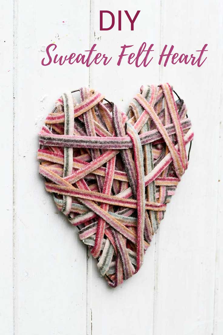 Recycle sweaters into a cute heart decoration for your wall for Valentine's.  A simple, cheap upcycling craft. #recyclesweaters #sweaterfelt #heartdecoration #valentinescraft  #valentinedecoarion