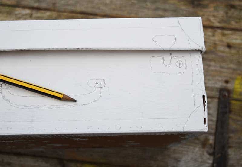 Pencil drawing on white shoe box