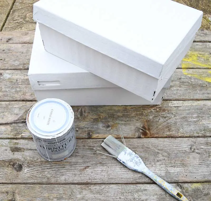 white painted shoe boxes