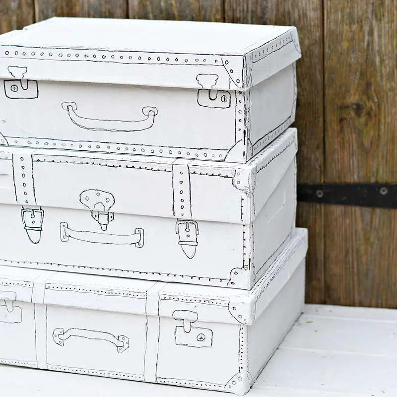 shoe boxes painted like vintage suitcases